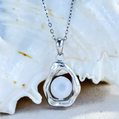 Lunar Shell aromatherapy jewellery by Lilanimus, white gold-plated diffuser necklace for peace and balance
