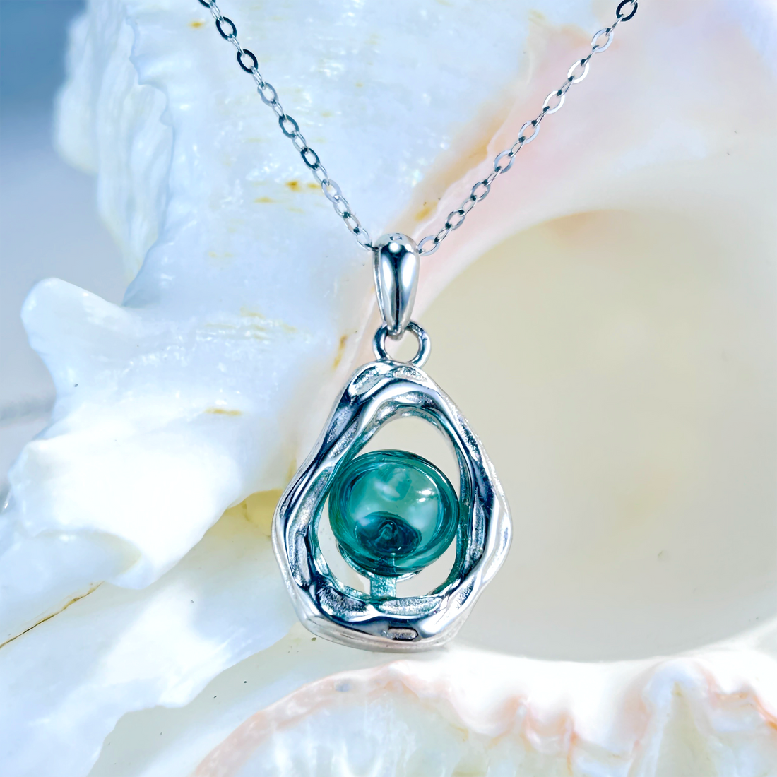 Crystal Breeze aromatherapy jewellery by Lilanimus, silver white gold-plated diffuser necklace