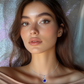Fashionista wearing the Midnight Shell Aromatherapy Necklace by Lilanimus, silver-plated diffuser necklace