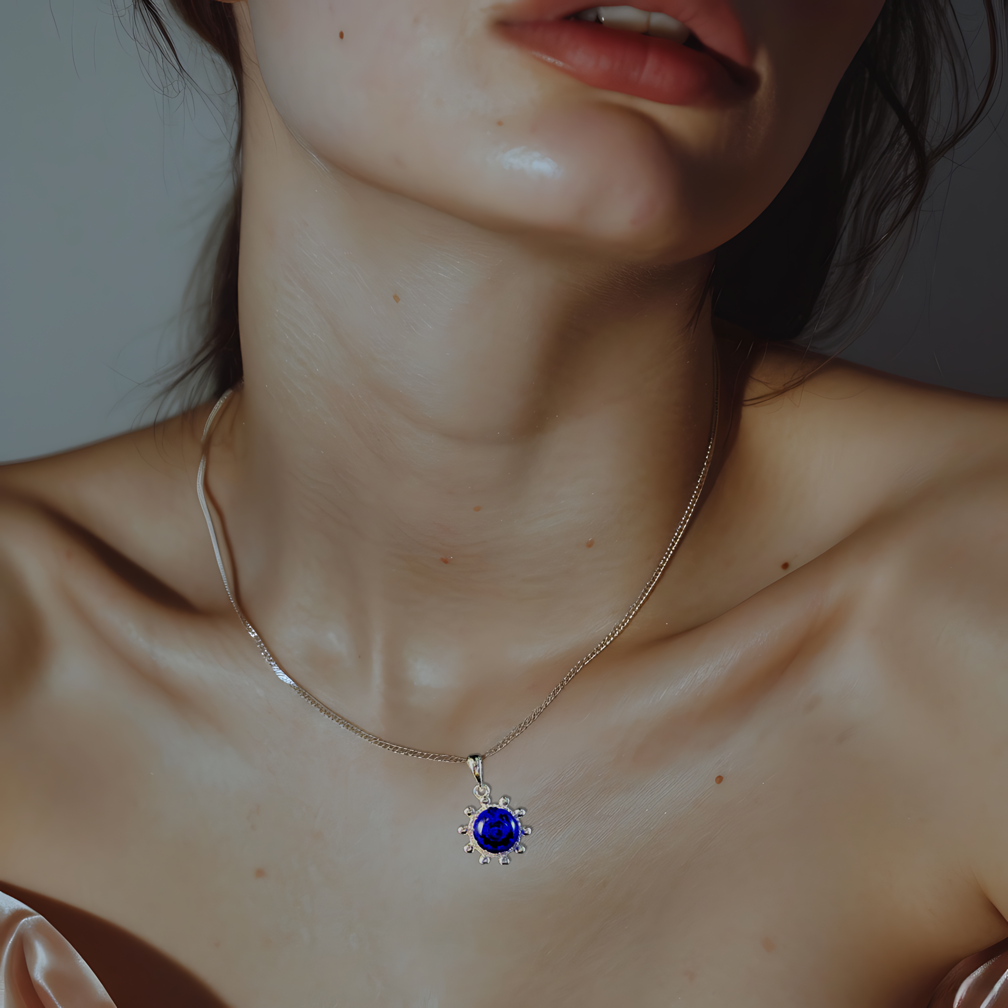 A girl wearing the Sunshine Corail Bleu Aromatherapy Necklace by Lilanimus, offering stress relief and wellness benefits